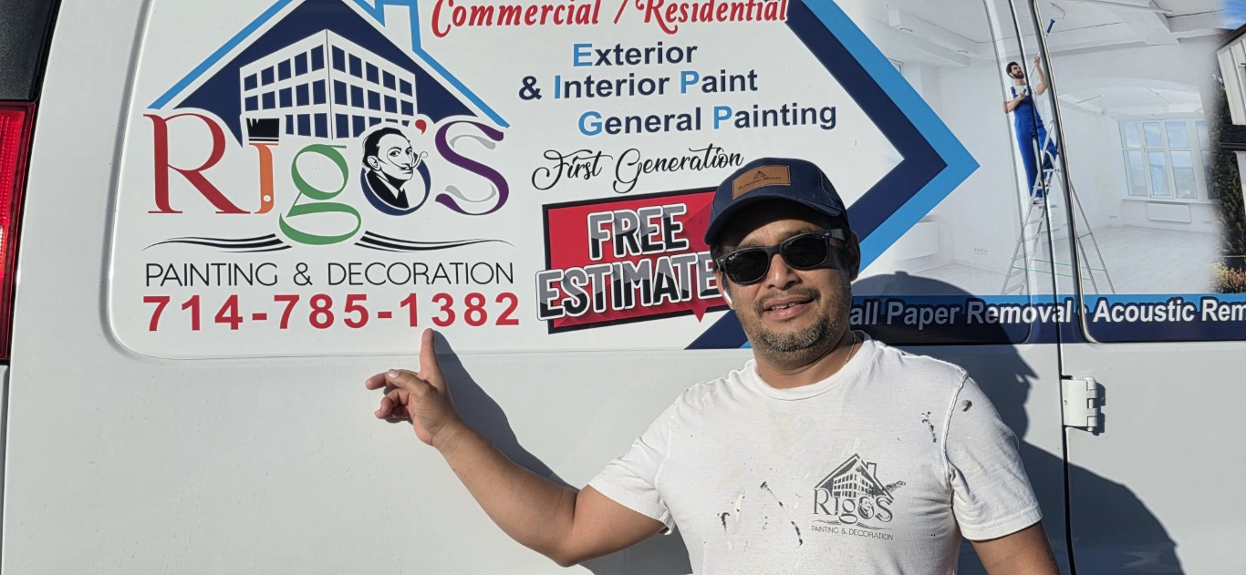 Rigos Painting owner proudly presenting the company brand and logo on service vehicle